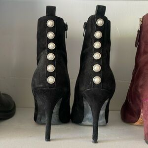 Black suede boots with pearl detail